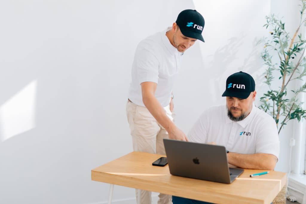 Two Run Digital strategists reviewing a client SEO audit together